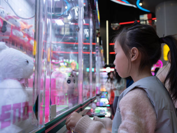 kids playing catch doll