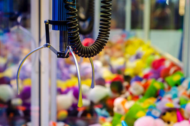 A claw crane game machine with toys