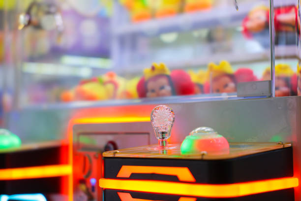 A Colorful Claw Machine Filled with Soft Plush Toys and Fun Offers.