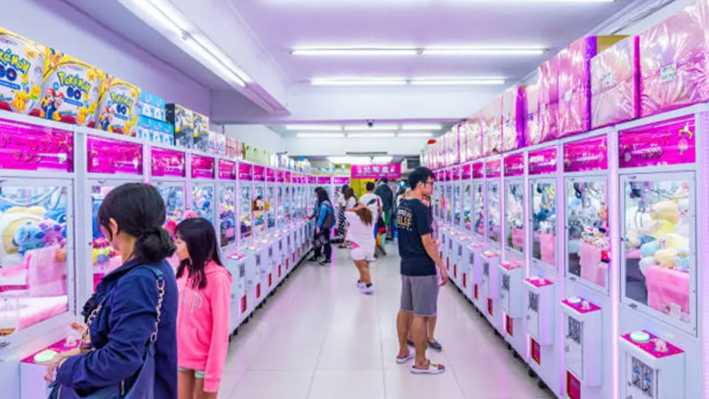an arcade with the crane game claw machine